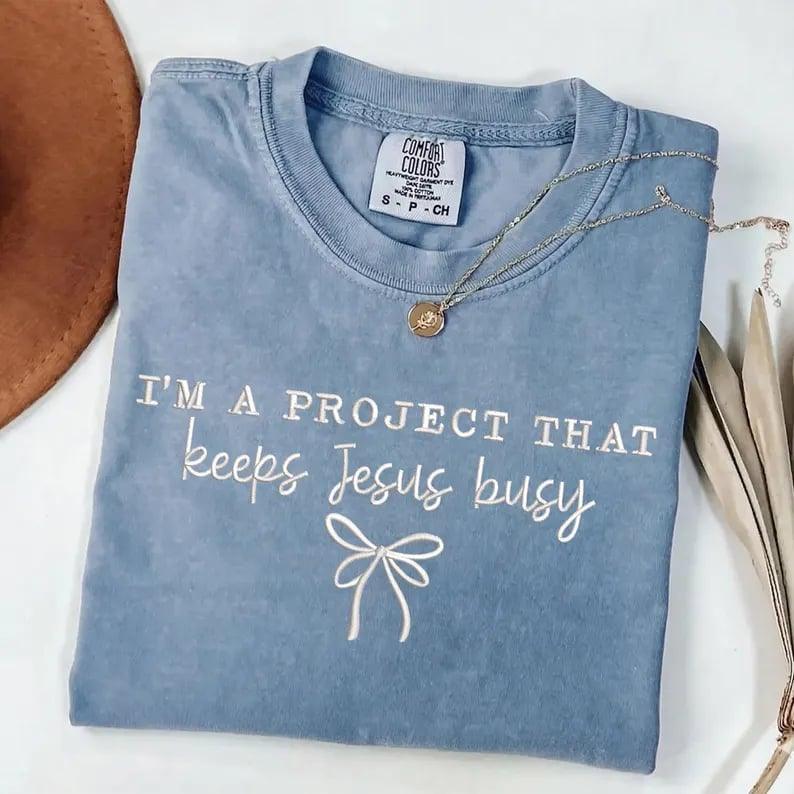 I'm a Project That Keeps Jesus Busy Embroidered Christian Shirt